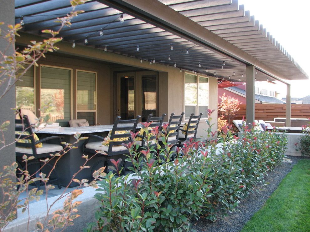 Edwards Boise for a Modern Patio with a Outdoor Kitchen and Harris Ranch Residence by Chuck B. Edwards   Breckon Land Design