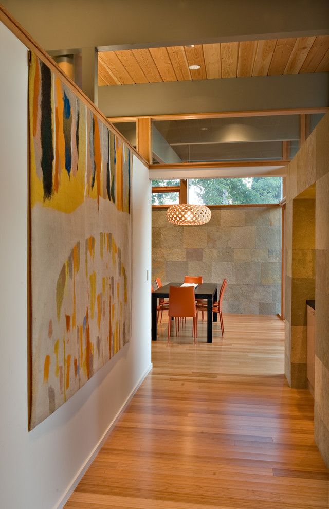 Eichler House for a Midcentury Hall with a Large Artwork and Quince Reverse Shed Eichler by Guy Ayers, Architect