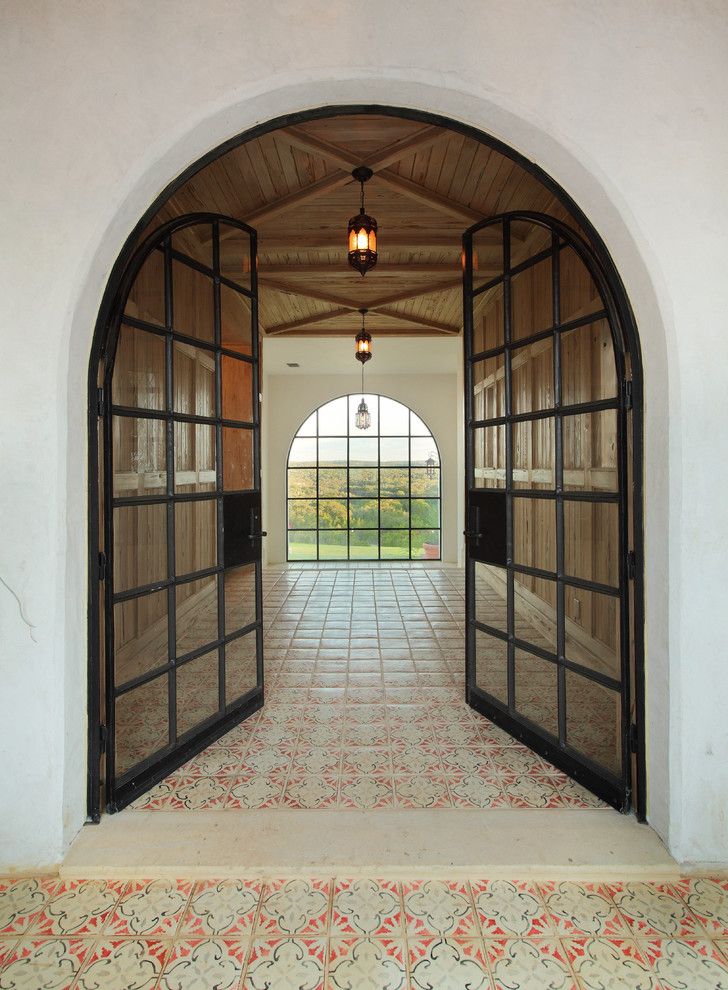 Emkay for a Rustic Entry with a Caustic Tile and Entry Foyer by Hugh Jefferson Randolph Architects