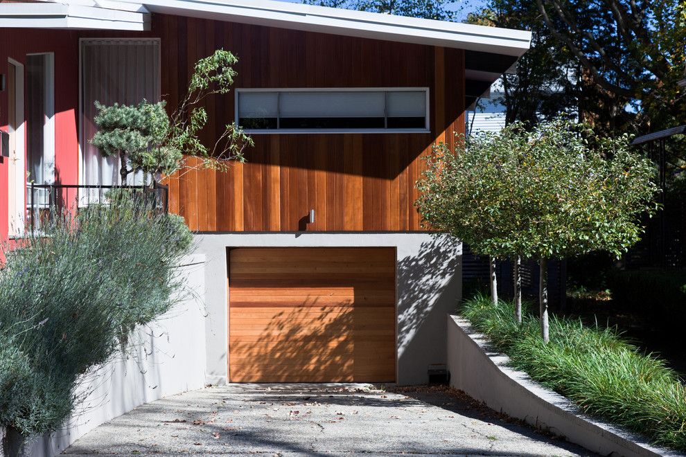 Espalier Fruit Trees for a Modern Garage with a Wood Siding and Hastings Lane by Matthew Cunningham Landscape Design Llc