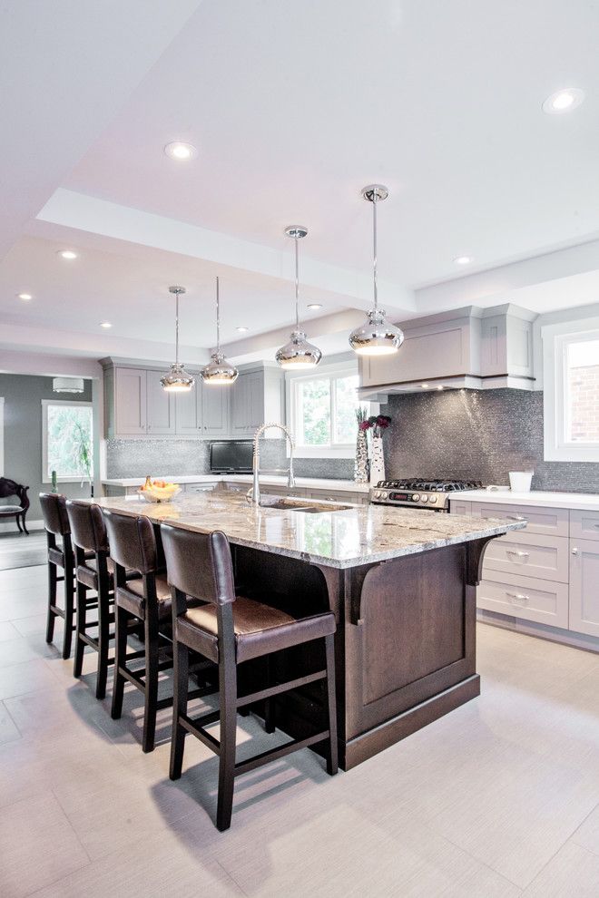 Espreso for a Transitional Kitchen with a Dark Wood Kitchen Island and Toronto Main Floor Home Renovation by Madison Taylor