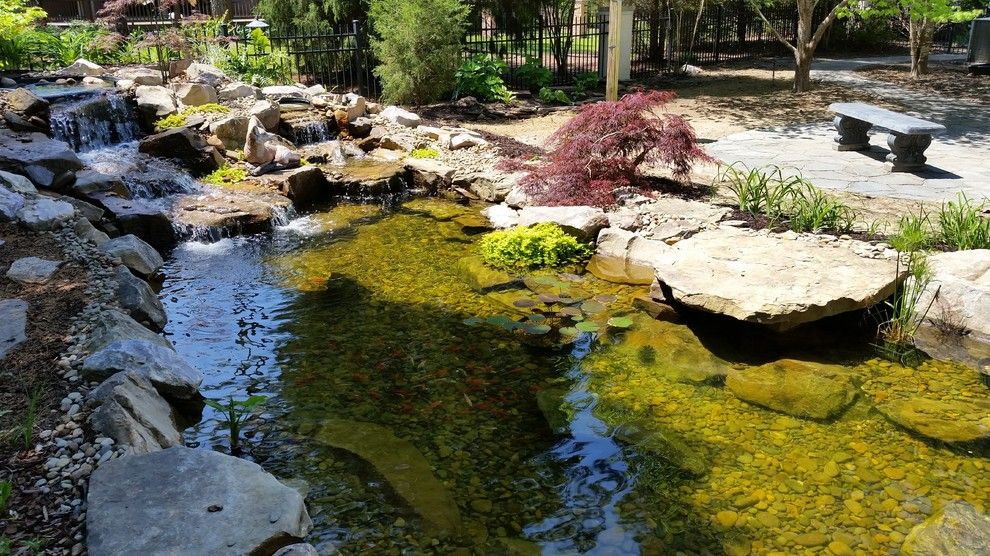 Evans Landscaping for a  Spaces with a Evans Ga and Koi Pond with Waterfalls and Patio / Walkway in Blythewood Sc by Mccormick Landscaping / Aquatic Solutions