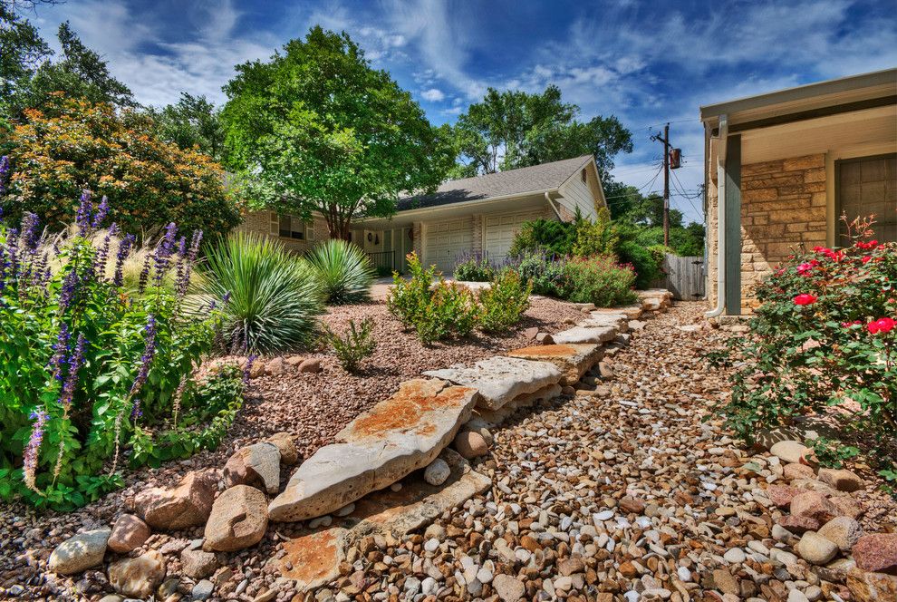 Ewing Irrigation for a Traditional Landscape with a Boulders and Project Five by Pearson Landscape Services