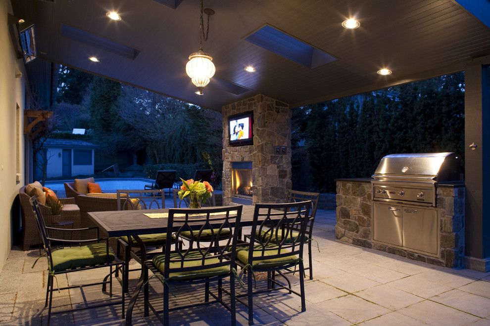 Excalibur Homes for a Traditional Patio with a Exterior Tv and Windermere Outdoor Room by Lakeville Homes