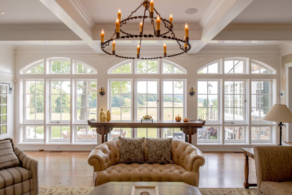 Eyebrow Arch for a Farmhouse Living Room with a Country House and Bryn Coed Farm by Archer & Buchanan Architecture, Ltd.