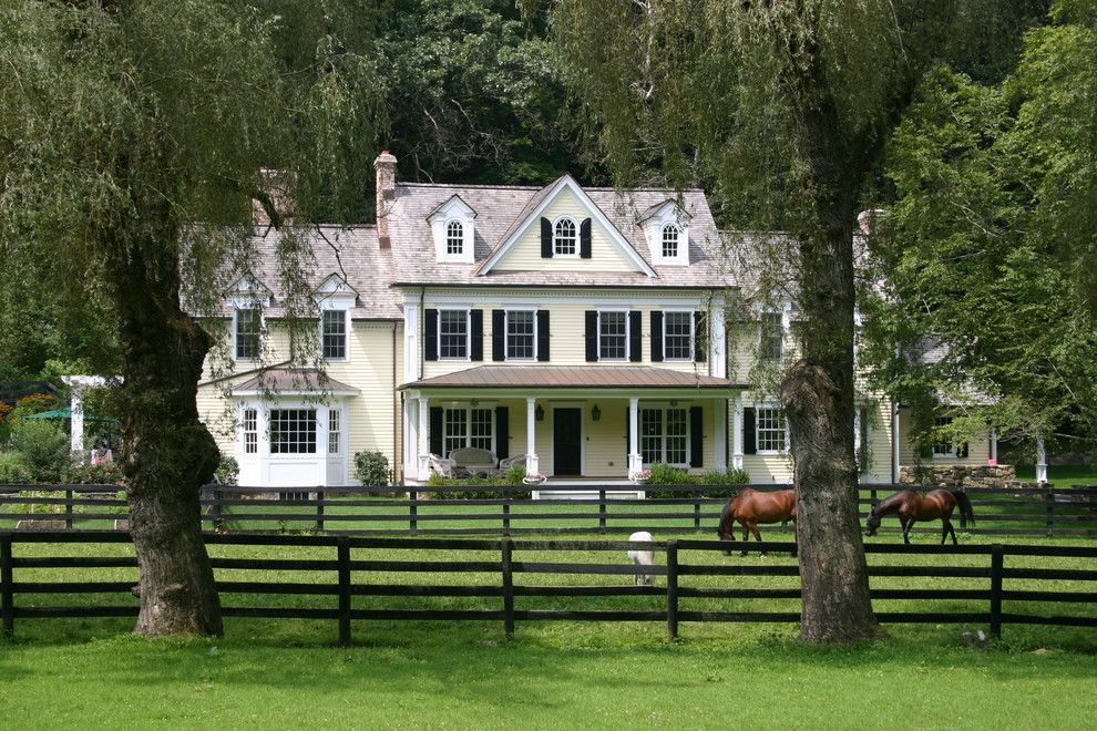 Fannin Tree Farm for a Farmhouse Exterior with a White Trim and Bedford Horse Farm by Cusato Management Corp.