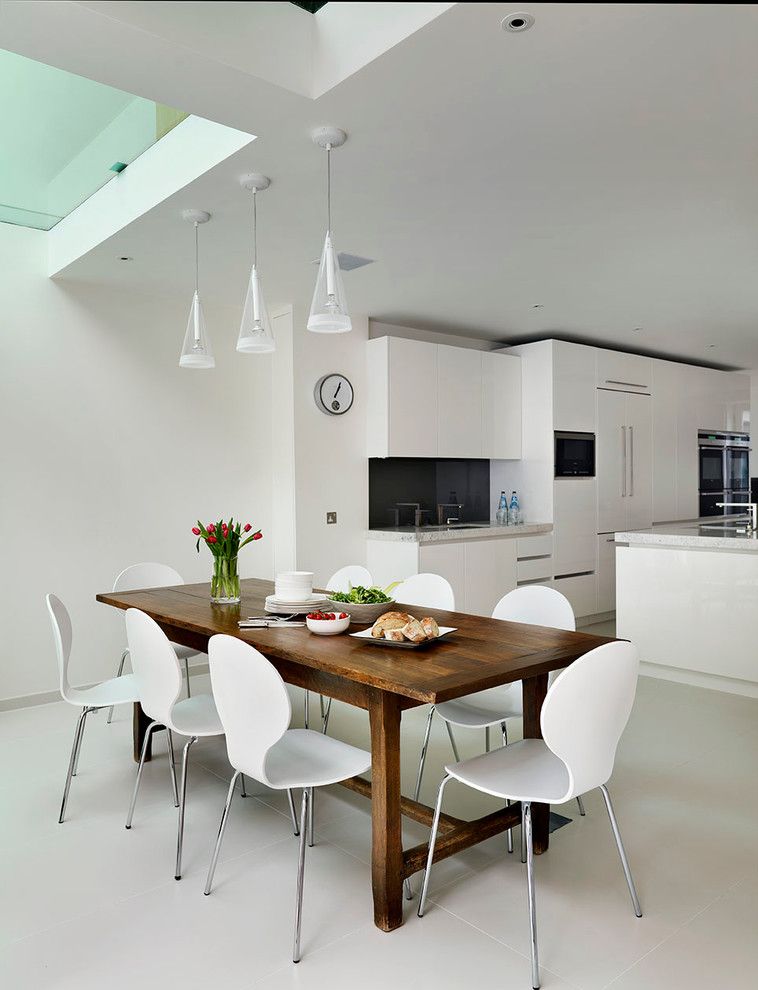 Farm Table Sf for a Contemporary Dining Room with a Rustic Wood Dining Table and Roundhouse White Kitchens by Roundhouse