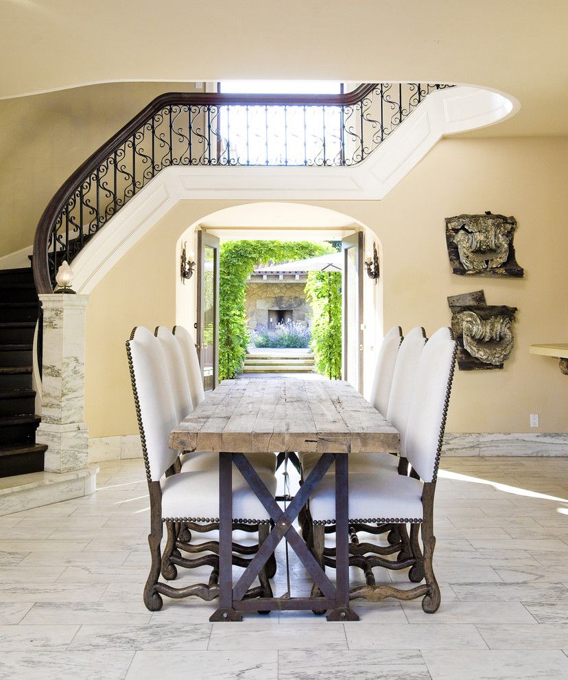 Farm Table Sf for a Mediterranean Dining Room with a Dining Table and Entry/dining by Lori Smyth Design