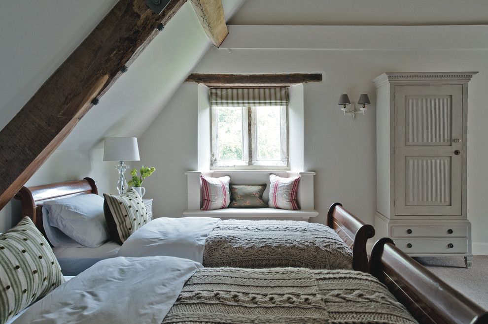 Farmgirl Flowers for a Farmhouse Bedroom with a Exposed Beams and Dorset Manor House by Sims Hilditch