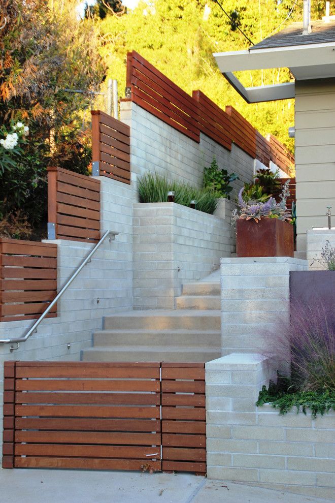 Fenceworks for a Contemporary Landscape with a Corten Steel and Mission Terraces by Szabo Landscape Architecture