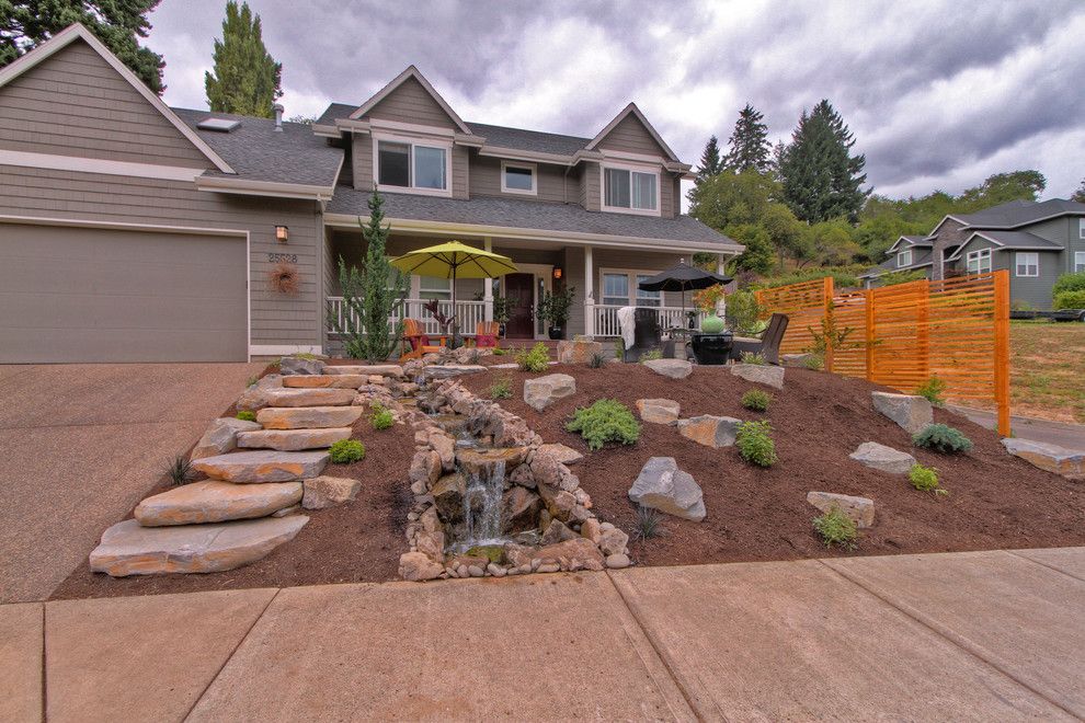 Feng Shui Front Door for a Traditional Landscape with a Water Feature and Gravel Courtyad   Water Fall   Slab Stone Steps   Privacy Screens by Paradise Restored Landscaping & Exterior Design