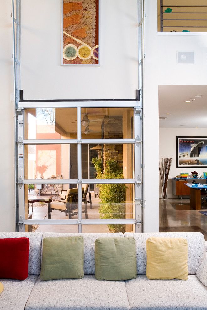 Ferguson Heating and Cooling for a Contemporary Patio with a Clear Garage Door and Blue Heron Residential Interiors by Jim K. Decker Photography