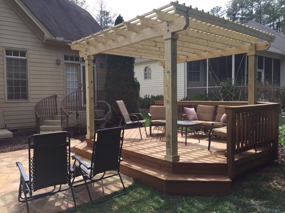 Firestone Raleigh Nc for a Traditional Spaces with a Design and Deck with Pergola in Raleigh, Nc by Archadeck of Raleigh Durham