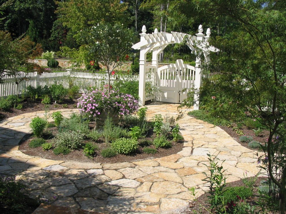 Flatstock for a Traditional Landscape with a Stone Pavers and Trellises by H&g Landscape Architects