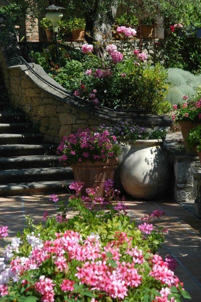 Flowerama for a Mediterranean Landscape with a Jardin Arbor and Provençal Garden by Atelier Nelumbo Garden Design