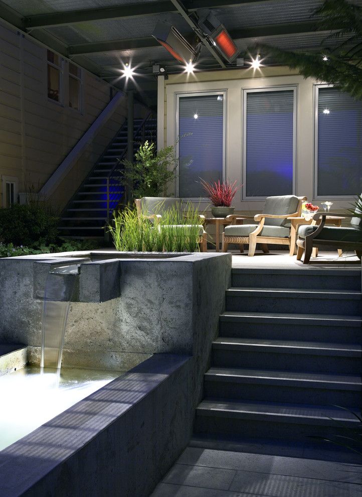 Fontana Theater for a Contemporary Patio with a Deck and Nightscape by Arterra Landscape Architects