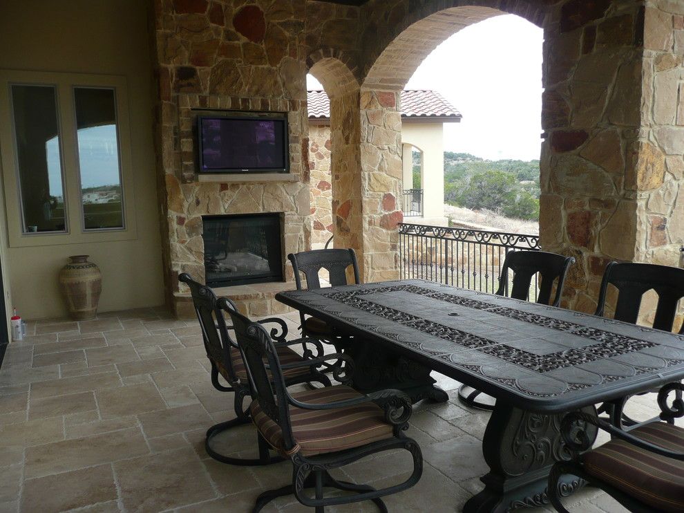 Fox Hills Golf Course for a Mediterranean Patio with a Natural Stone Fireplace with Television and 3850 Pawnee Pass, Overlook of Flintrock by Canyon Creek Homes, Lp