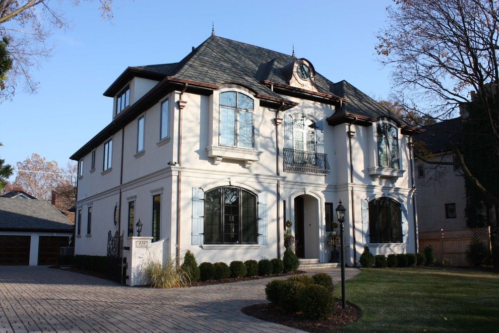 French Chateau for a Traditional Exterior with a Entrance and Historic Lagrange Home by Derrick Architecture