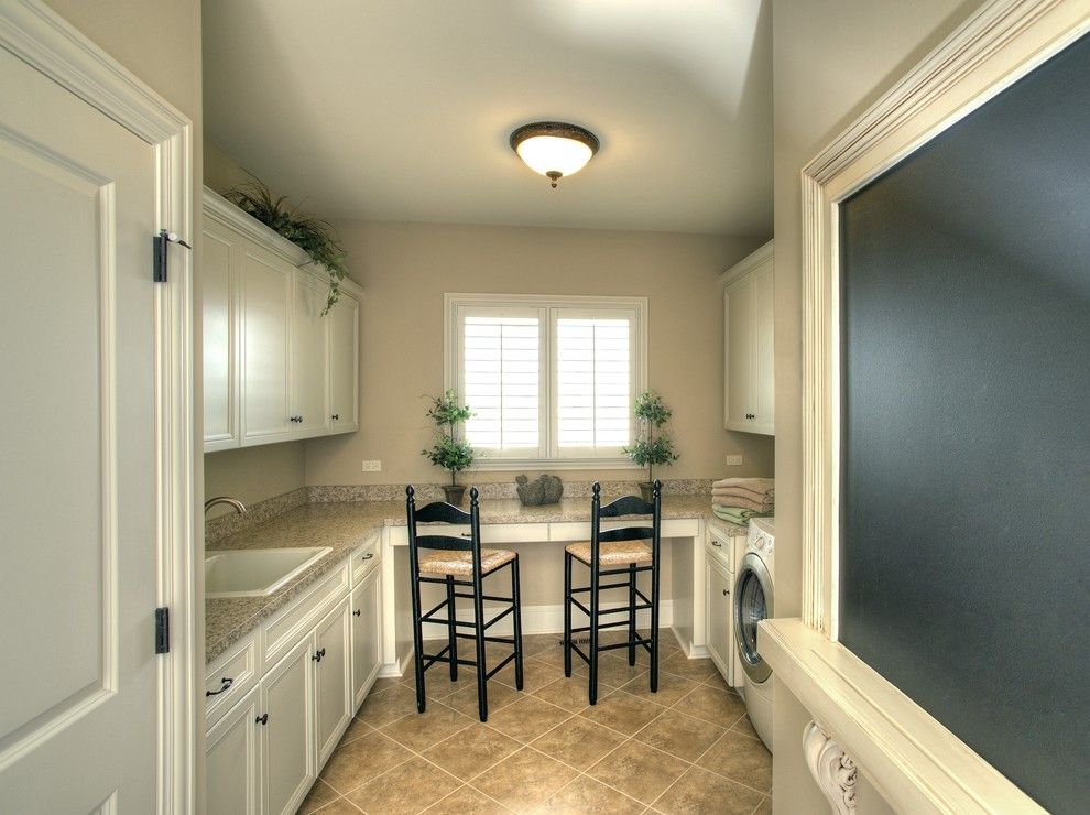 Front Load Washer Smell for a Traditional Laundry Room with a Chalkboard and Hobby Mud Room by John Hall Custom Homes