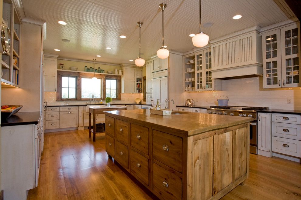 Front Range Lumber for a Farmhouse Kitchen with a Kitchen Ledge and Mill Creek Ridge Farmhouse by Murphy & Co. Design