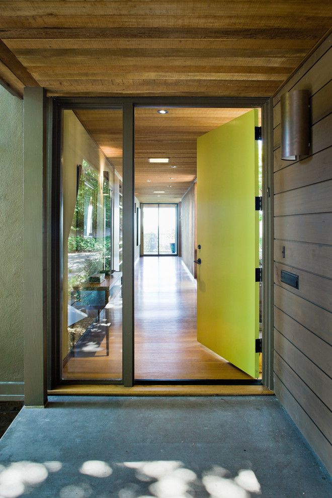 Frontroom Furnishings for a Modern Entry with a Natural and Mid Century Modern Renovation by Koch Architects, Inc.  Joanne Koch