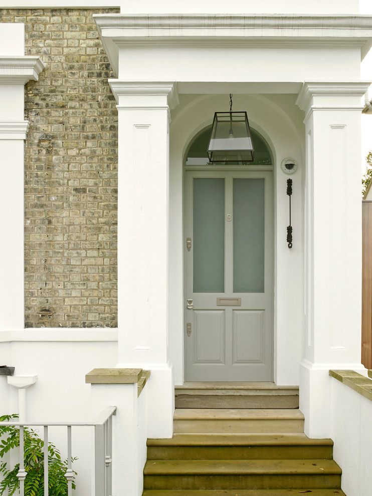 Frontroom Furnishings for a Victorian Entry with a Front Door and Wimbledon House by Stephen Fletcher Architects