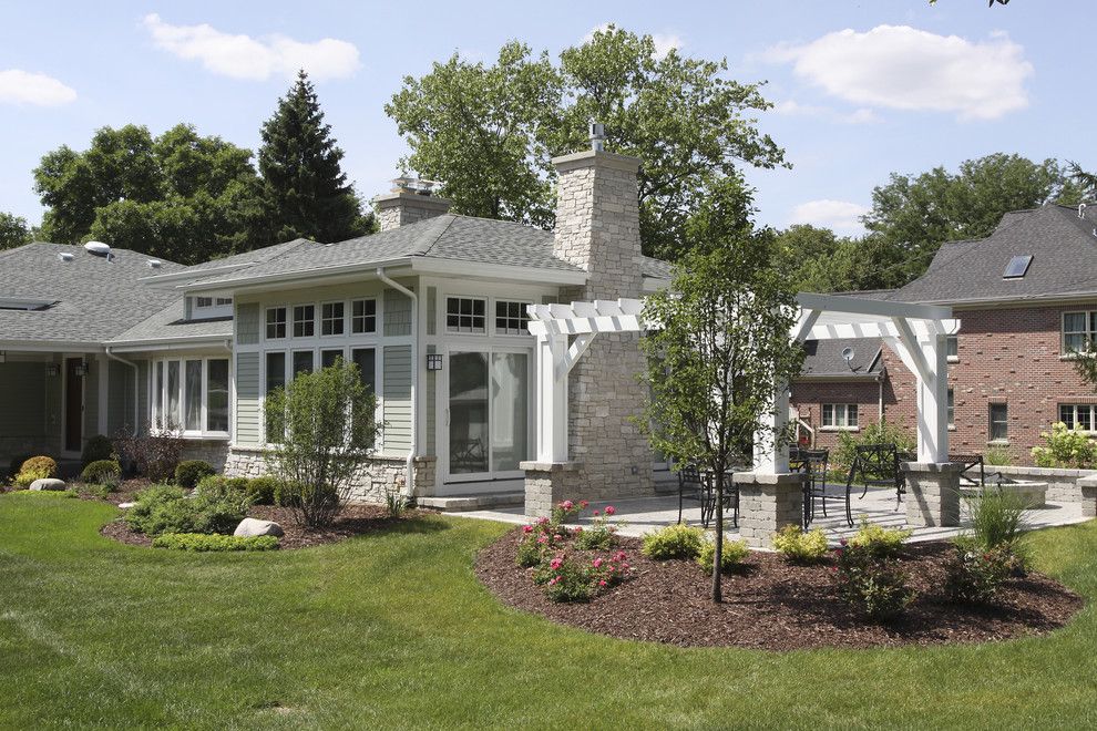 Gaf Timberline Shingles for a Traditional Patio with a Prairie Style and Backyard by Normandy Remodeling