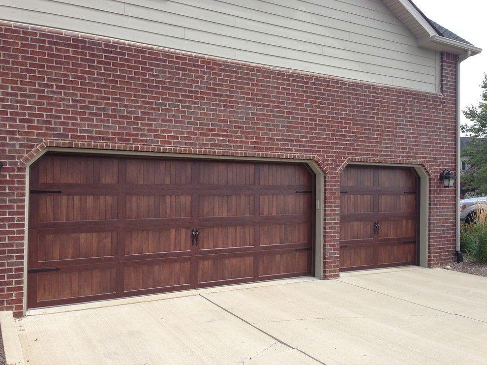 Garage Northville for a Traditional Garage with a Garage Door and Faux Wood Garage Doors by Premier Door Service