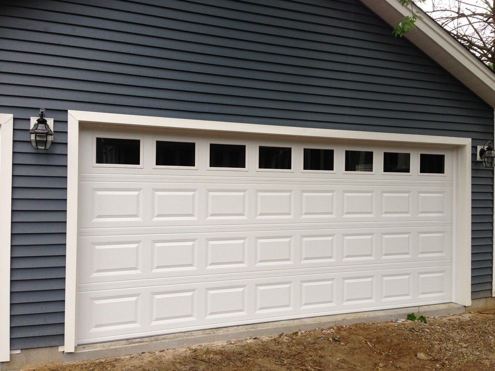 Garage Northville for a Traditional Garage with a Garage Door and Traditional Raised Panel Garage Doors by Premier Door Service