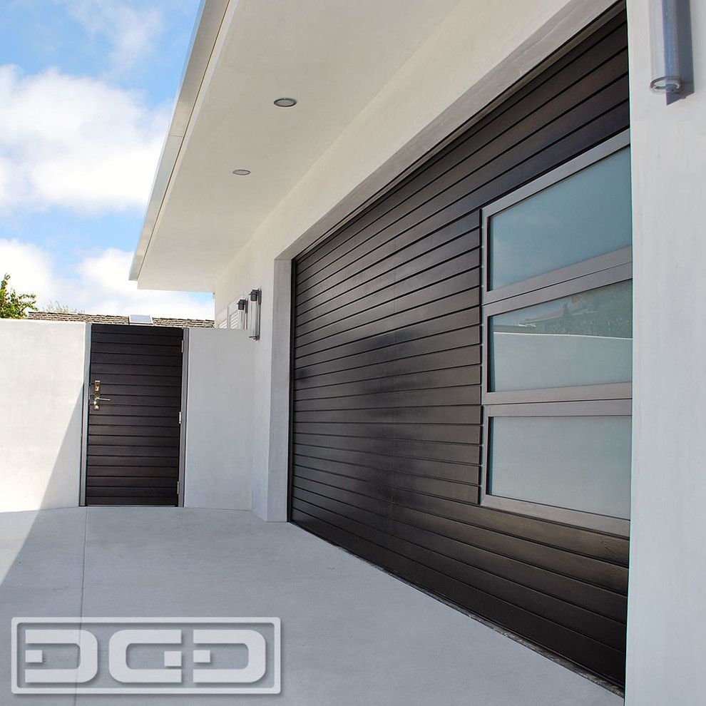 Garagetek for a Modern Shed with a Modern Landscaping and Modern Garage Door, Matching Pedestrian Gates & Steel Architectural Entry Gates by Dynamic Garage Door