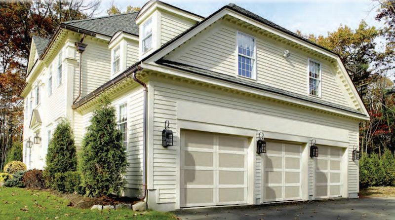 Garagetek for a Traditional Garage with a Beige Exterior and Carriage House by Overhead Door Company of Albany