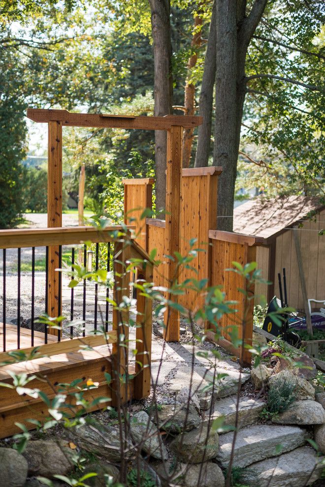 Gardenscapes for a Asian Landscape with a Michigan and Japanese Style Cedar Gate by Lotus Gardenscapes & Bloom Garden Center