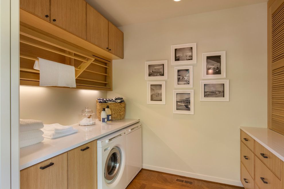 Gas Dryer vs Electric Dryer for a Midcentury Laundry Room with a Rift White Oak Cabinets and Street of Dreams 2015 | the Shaw House by Rockwood Cabinetry