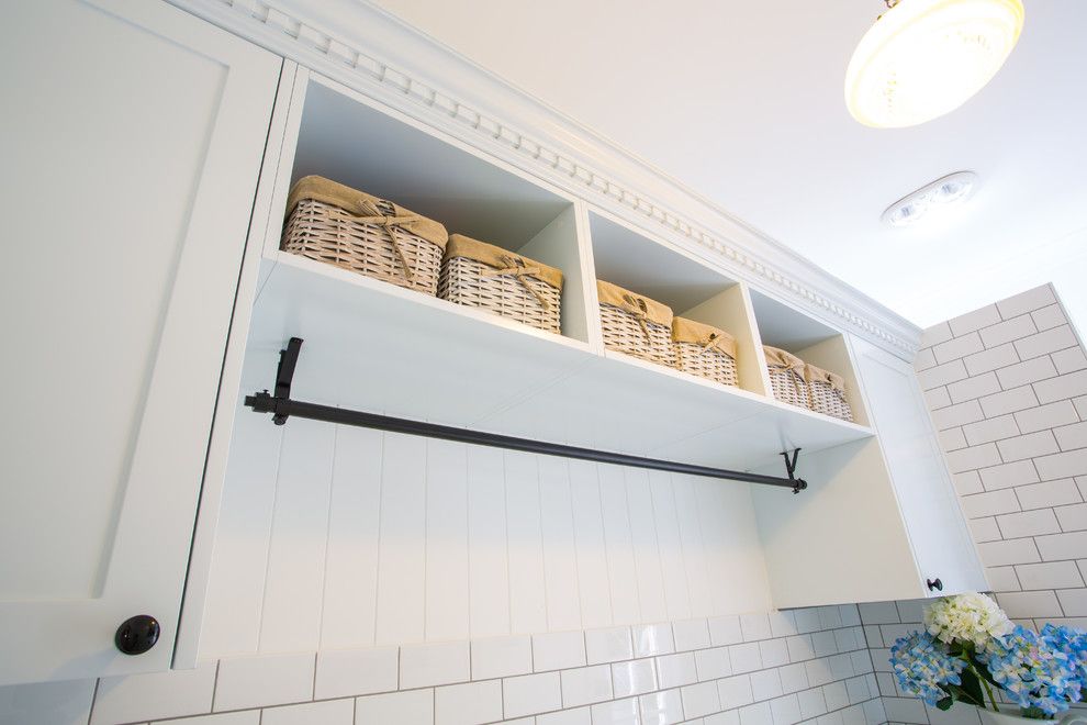 Gas Dryer vs Electric Dryer for a Traditional Laundry Room with a Laundry and Hampton Style Laundry by Makings of Fine Kitchens & Bathrooms