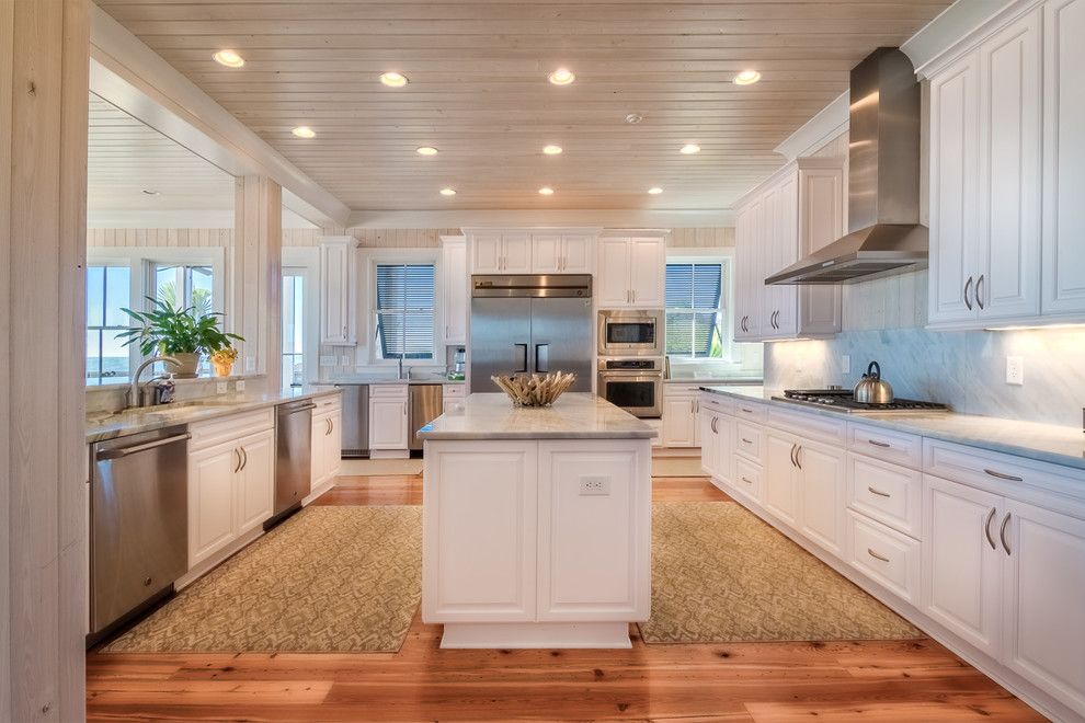 Gas Dryer vs Electric for a Beach Style Kitchen with a Kitchen Island and North Litchfield Beach House by Catalyst Architects, Llc