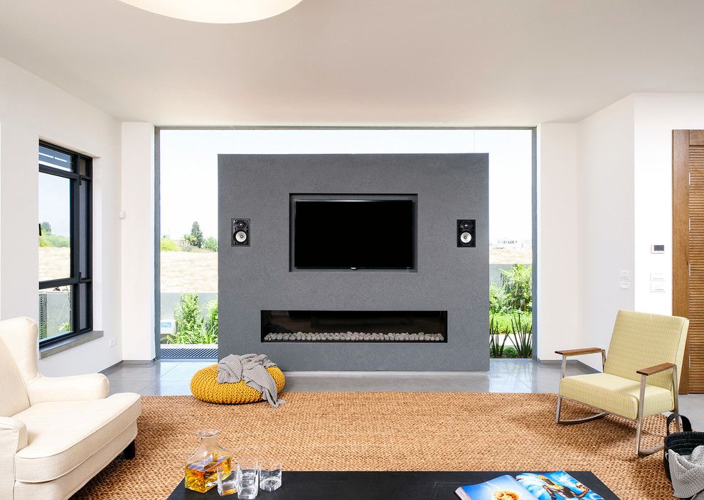 Gas vs Electric Dryer for a Contemporary Living Room with a Speakers and a House at Hod Hasharon by Moshi Gitelis   Photographer