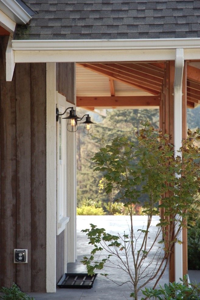 Gig Harbor Theater for a Eclectic Spaces with a Barn Wood Siding and 'Harbor Heaven' Gates Residence  Gig Harbor, Wa by Harvest Timber Specialty Products