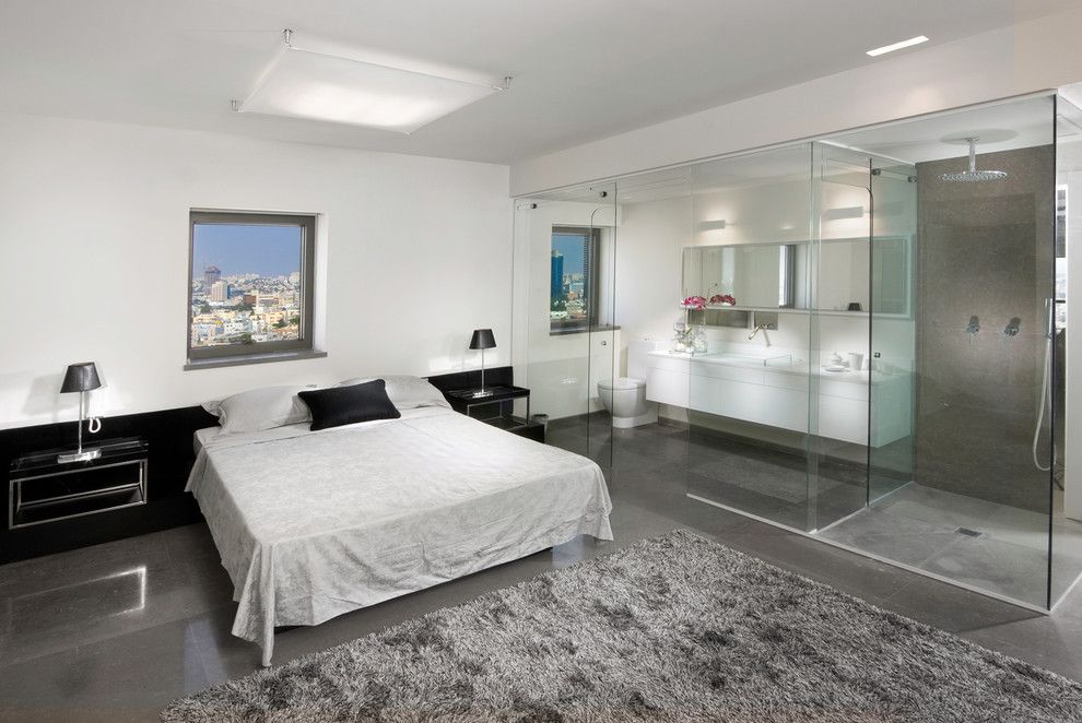 Glassed for a Contemporary Bedroom with a Concrete and Bedroom by Elad Gonen