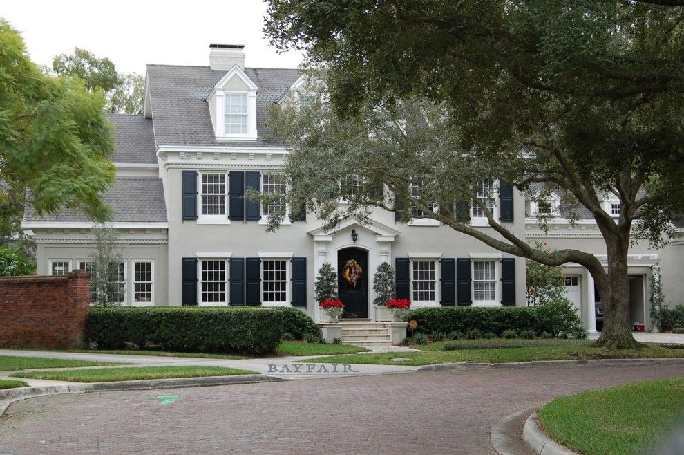 Glidden House for a Traditional Exterior with a Front Yard Landscape and Golfview Traditional Home by Jennifer Garcia Architecture Studio