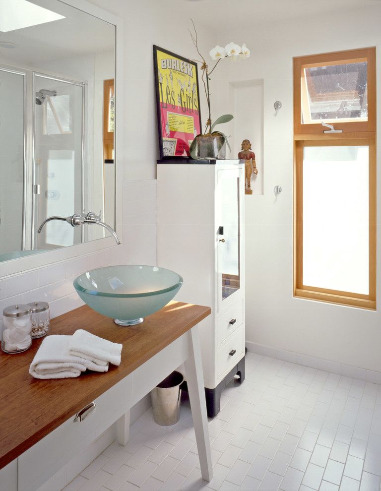 Goldsteins Furniture for a Contemporary Bathroom with a Wall Mounted Faucet and Shaiman Residence by Juan Felipe Goldstein Design Co.