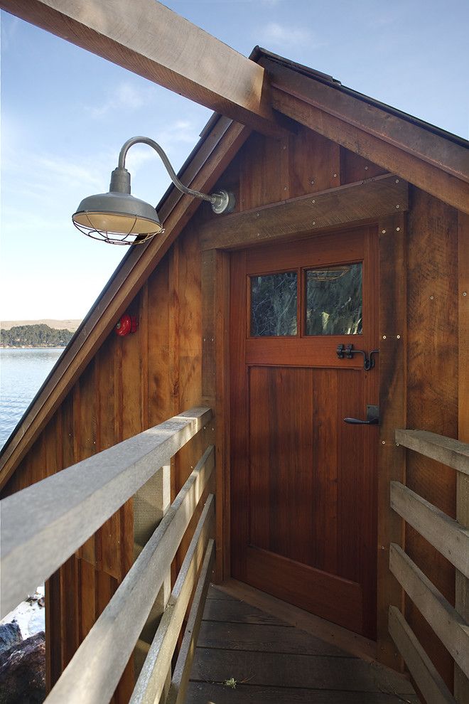 Great Neck Nissan for a Rustic Entry with a Door and Boat House by Barn Light Electric Company