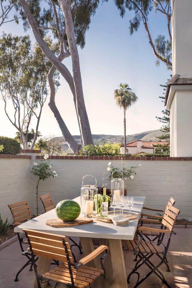 Greek Revival Homes for a Traditional Patio with a Normandy Revival and El Camino Del Mar, Laguna Beach by Clark Collins   Collins Design & Development