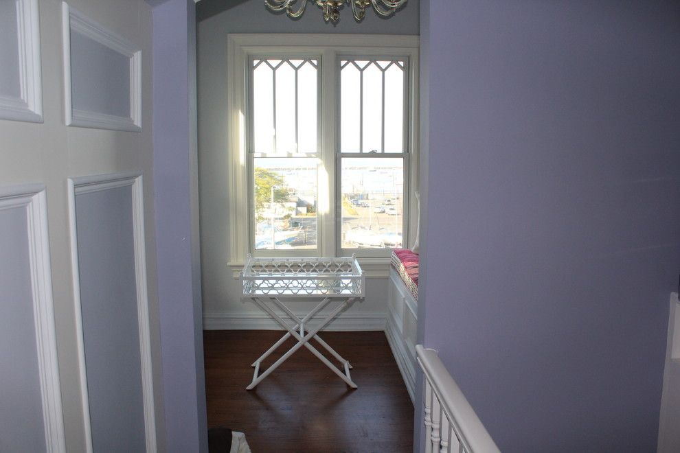 Grote Lighting for a Traditional Sunroom with a Pella Windows and Third Floor Victorian by Caccamo Kitchens & Baths, Inc.