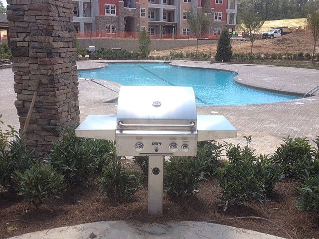 Hearth and Grill for a Contemporary Patio with a Gas and American Outdoor Grill with in Ground Post by Fine's Gas by Fine's Hearth & Patio