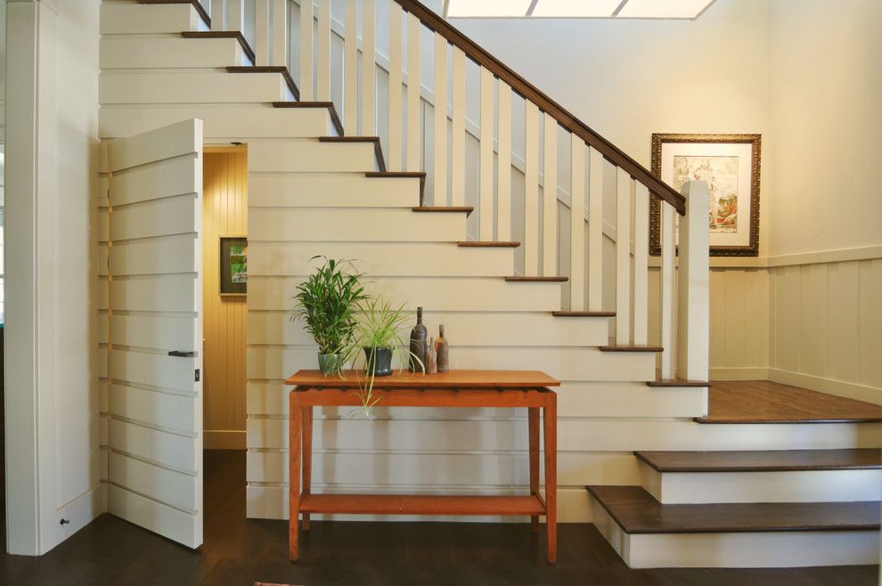 Hideaway Storage for a Traditional Staircase with a Chair Rail and Lakeview Park Renovation by Alchemy Design Studio