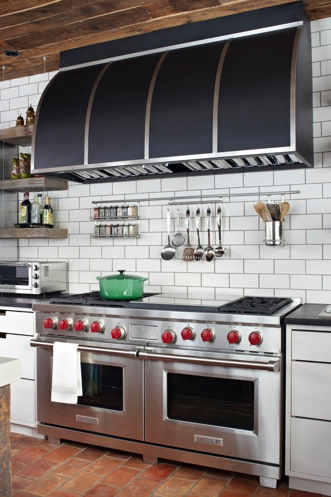 Holy Lamb Organics for a Transitional Kitchen with a Wood Ceiling and European Cottage by Burns and Beyerl Architects