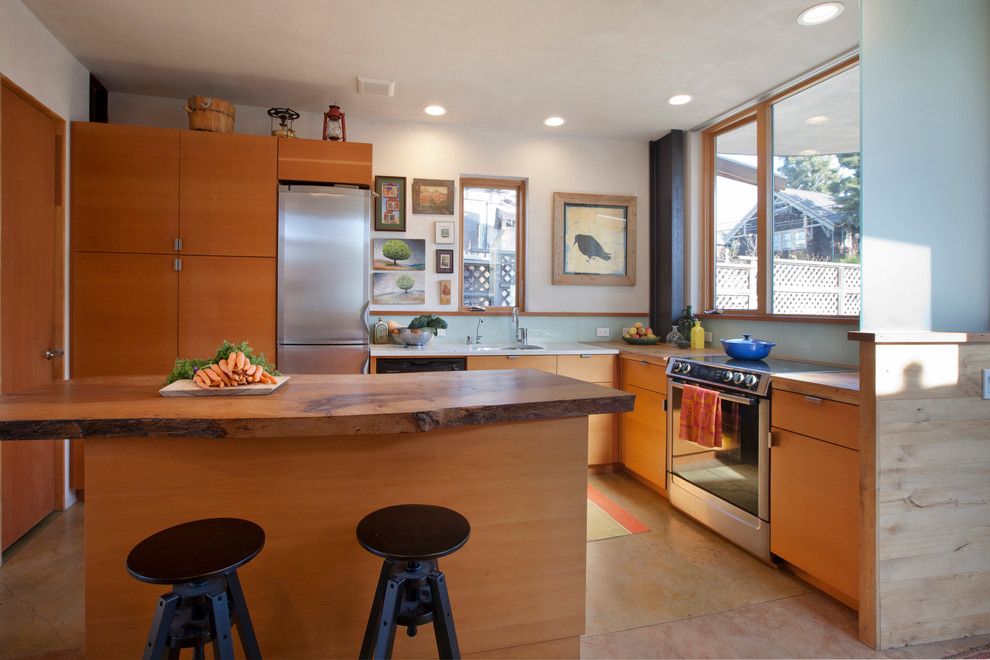 Home Improvement Cast for a Eclectic Kitchen with a Live Edge Counter Top and Mcgee Salvage House by Leger Wanaselja Architecture