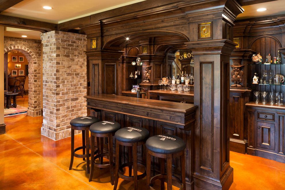 Homesmart Realty for a Traditional Home Bar with a Tile Floor and Elegant English Country Home by Kyle Hunt & Partners, Incorporated