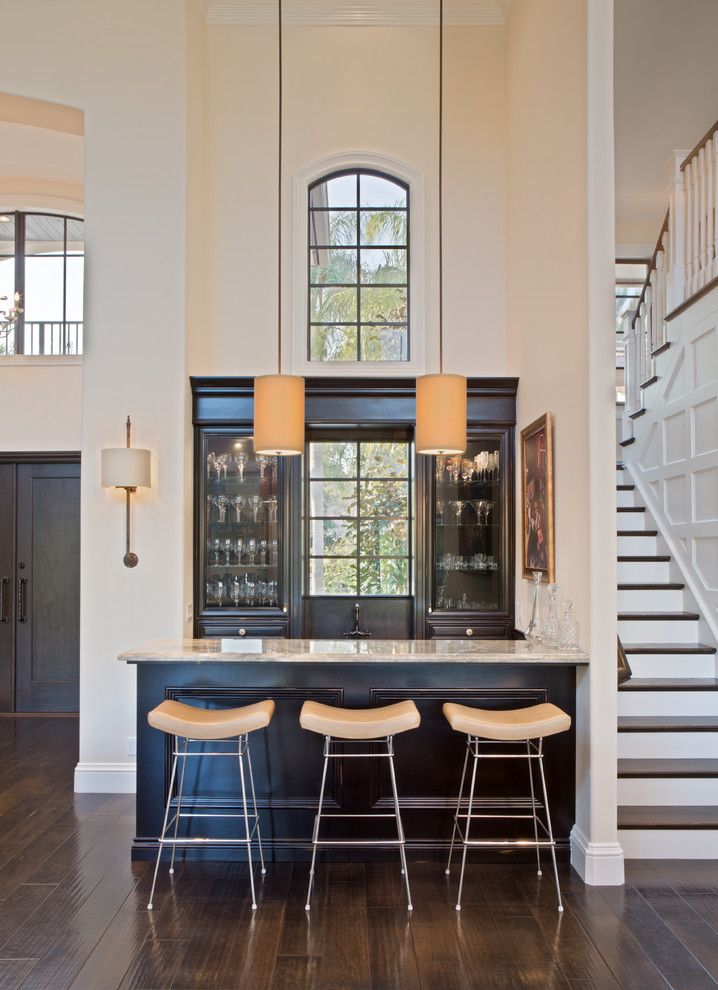 Hometeam Properties for a Transitional Home Bar with a Glass Shelves and Hamptons Woodfield Country Club Addition and Remodel by Nmb Custom Homes and Renovations, Llc