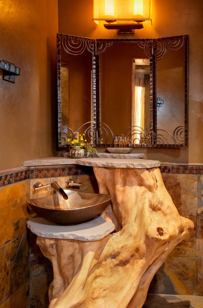 Homewise Santa Fe for a Mediterranean Powder Room with a Natural and Historic Charmer in Santa Fe by Samuel Design Group